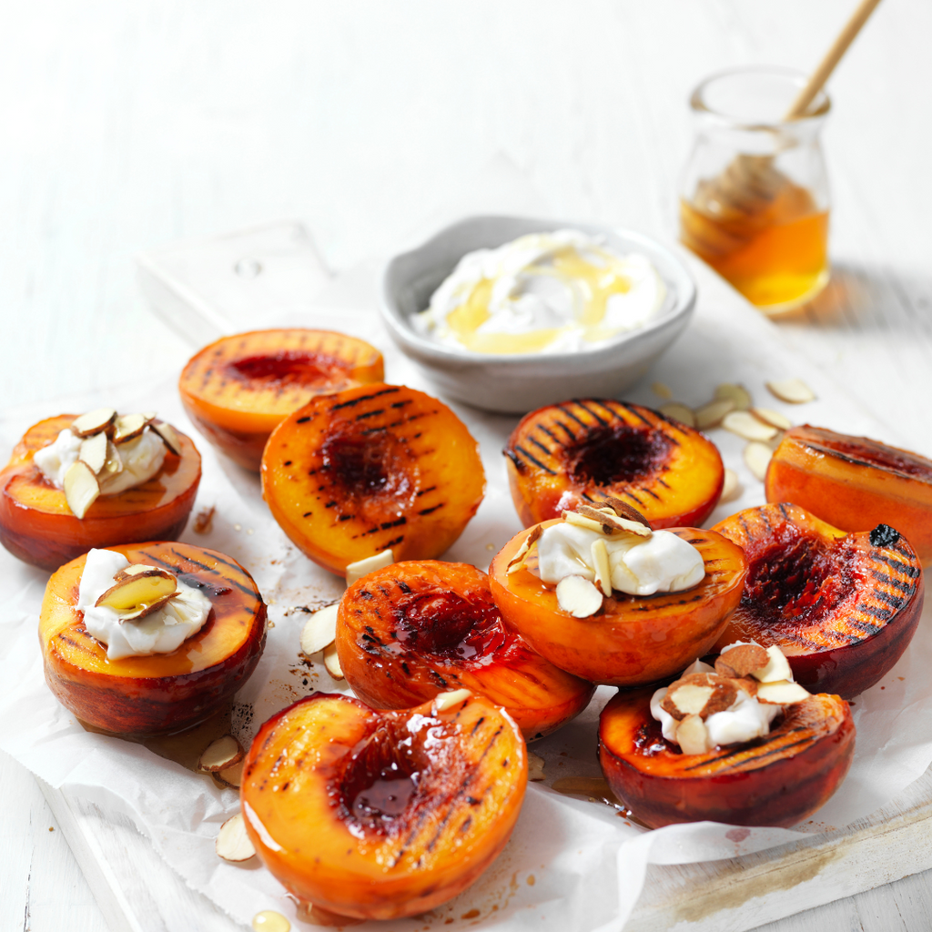 CHAR-GRILLED PEACHES WITH COCONUT SOUR CREAM & HONEY DRIZZLE